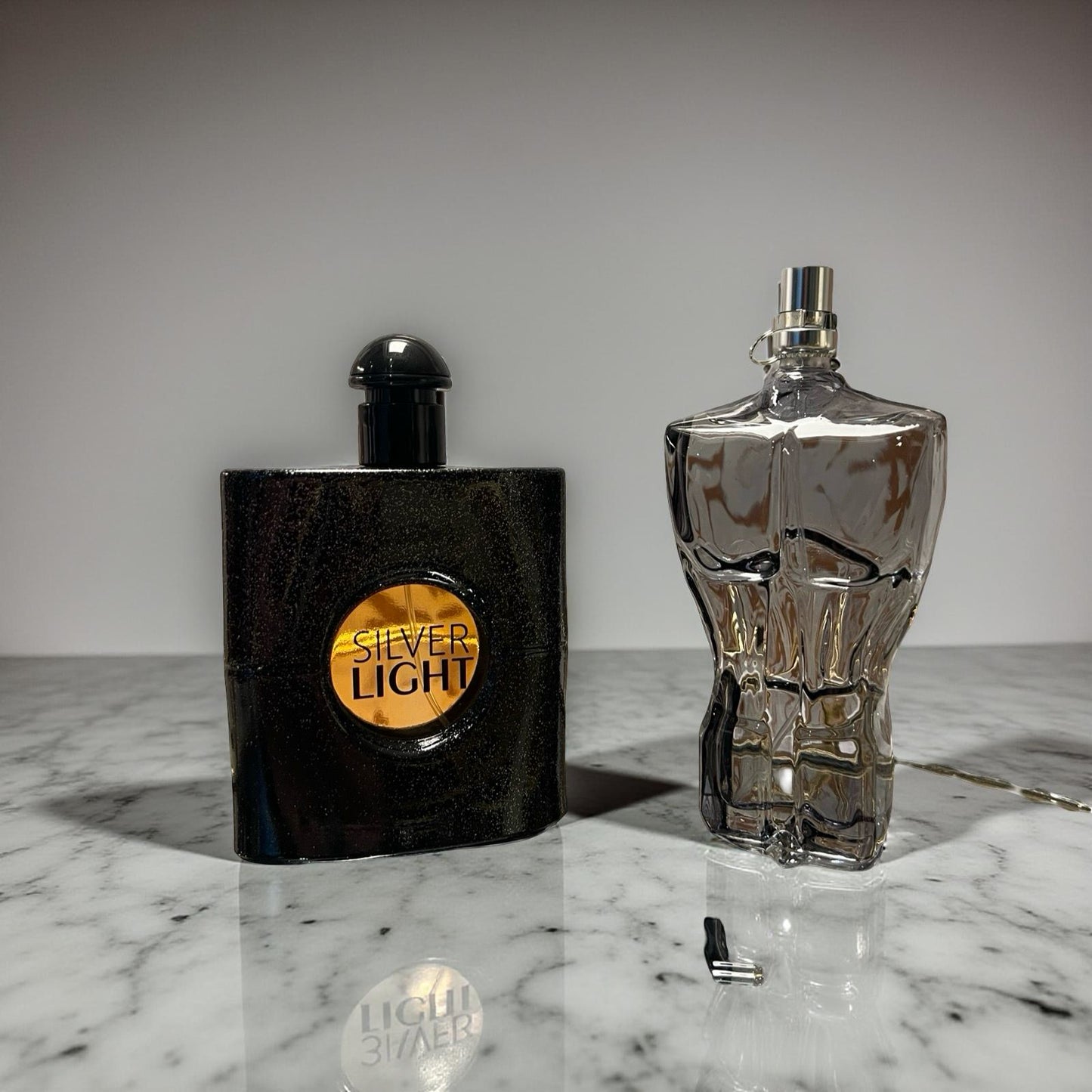 SET 2 PARFUMURI PENTRU EL SI EA (SILVER LIGHT-HOMME VIRIL)